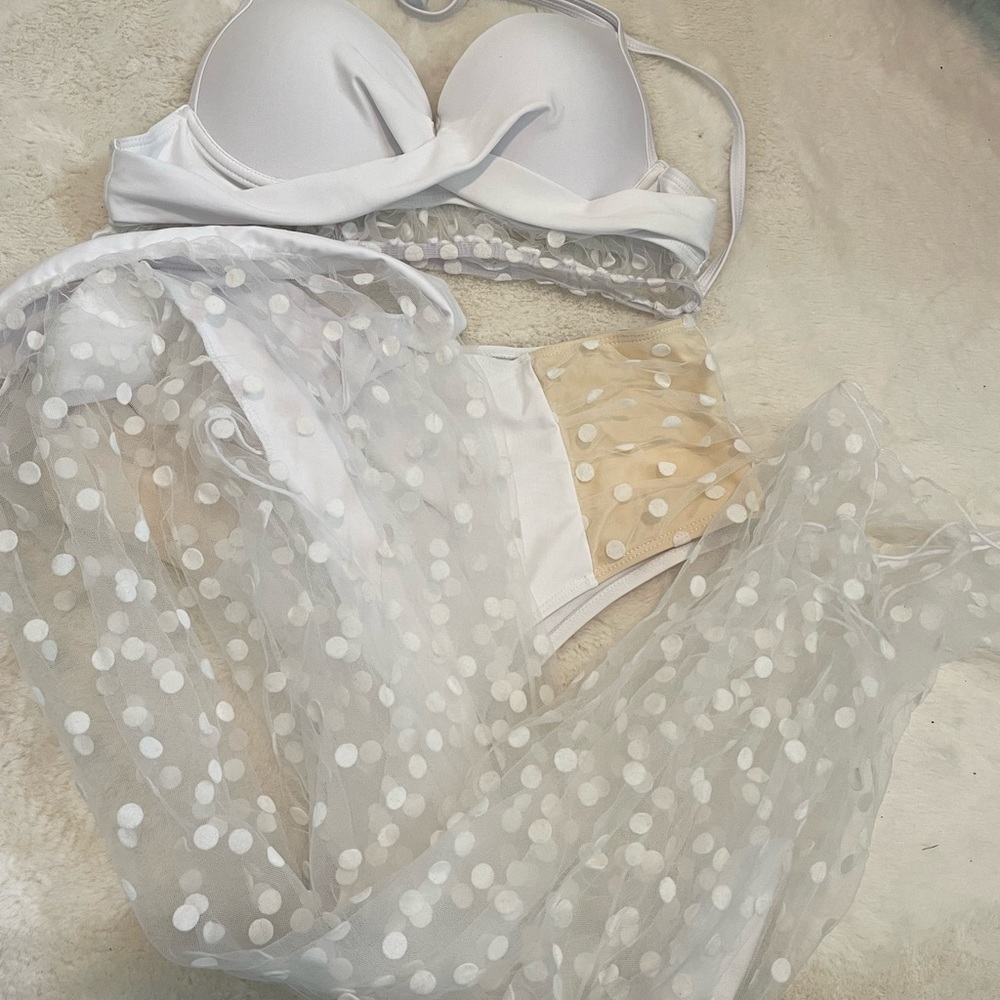 White bathing suit with polka dot wrap skirt